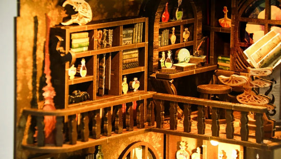 Witch's Enchanted Workshop miniature scene illuminated by warm LED lights